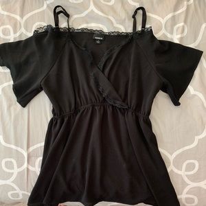 Black, cold shoulder top with lace trim detail.